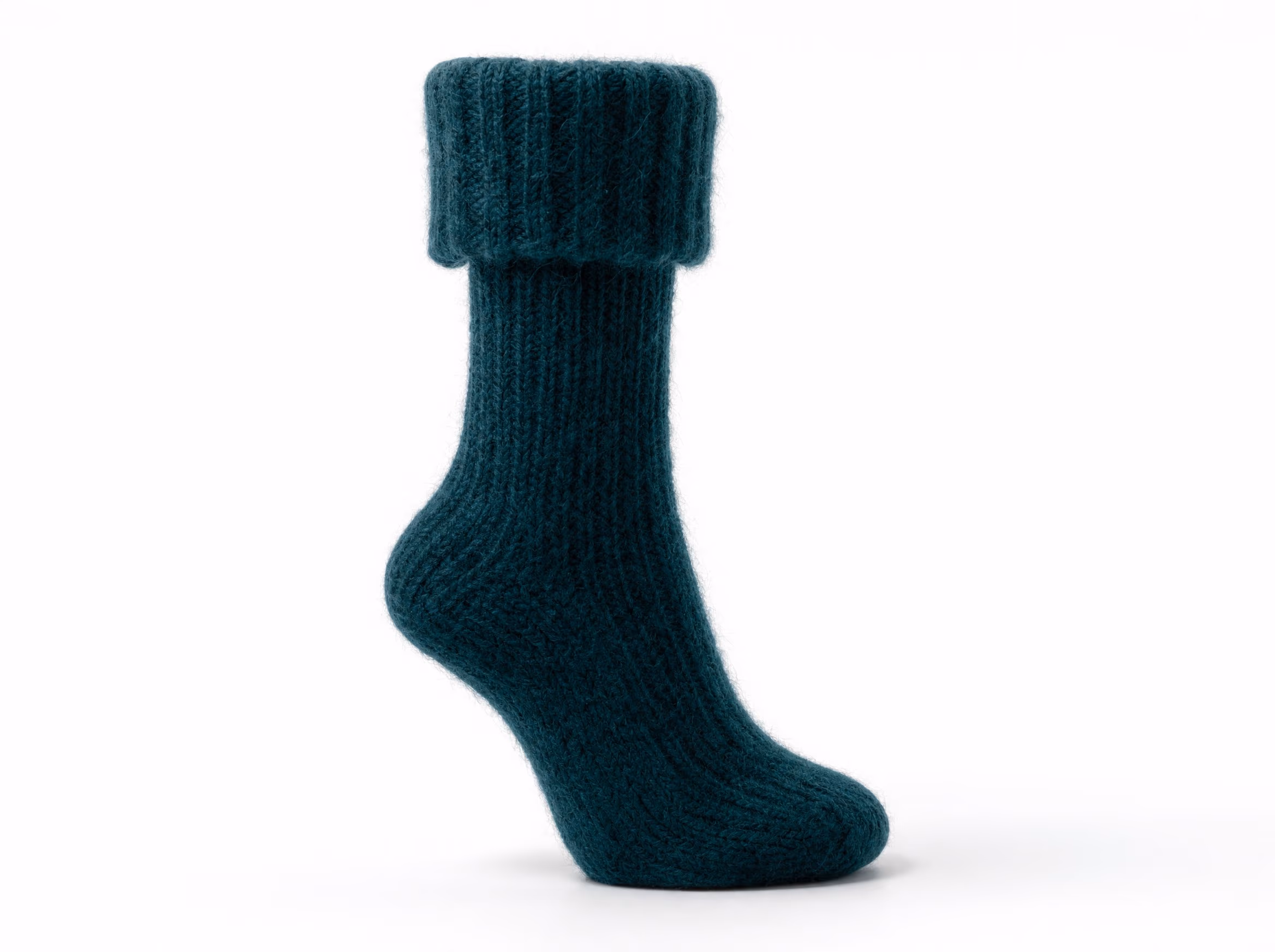 A single deep-teal boot sock in a lofty brushed alpaca-wool knit, shown standalone on a white studio background